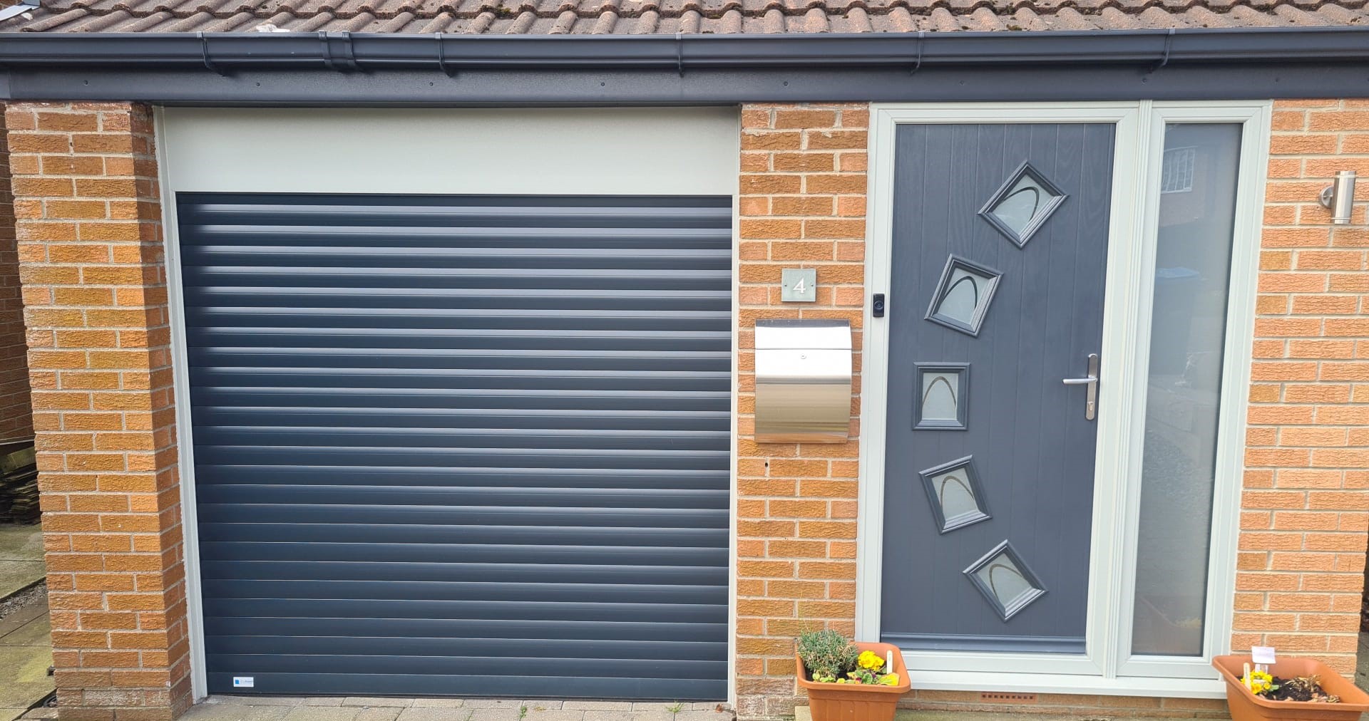 Alluguard 77 electric roller garage door with Octon composite door crescent glass anthracite grey, agate grey frame 2