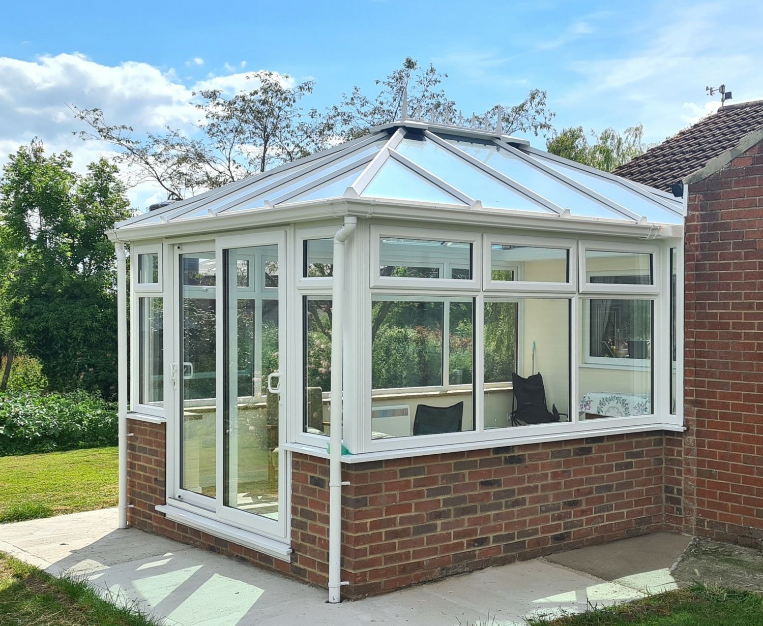White UPVc Conservatory ambi sunshade glass sliding doors